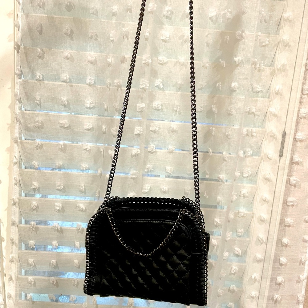 Black leather cross body with chain and handle
